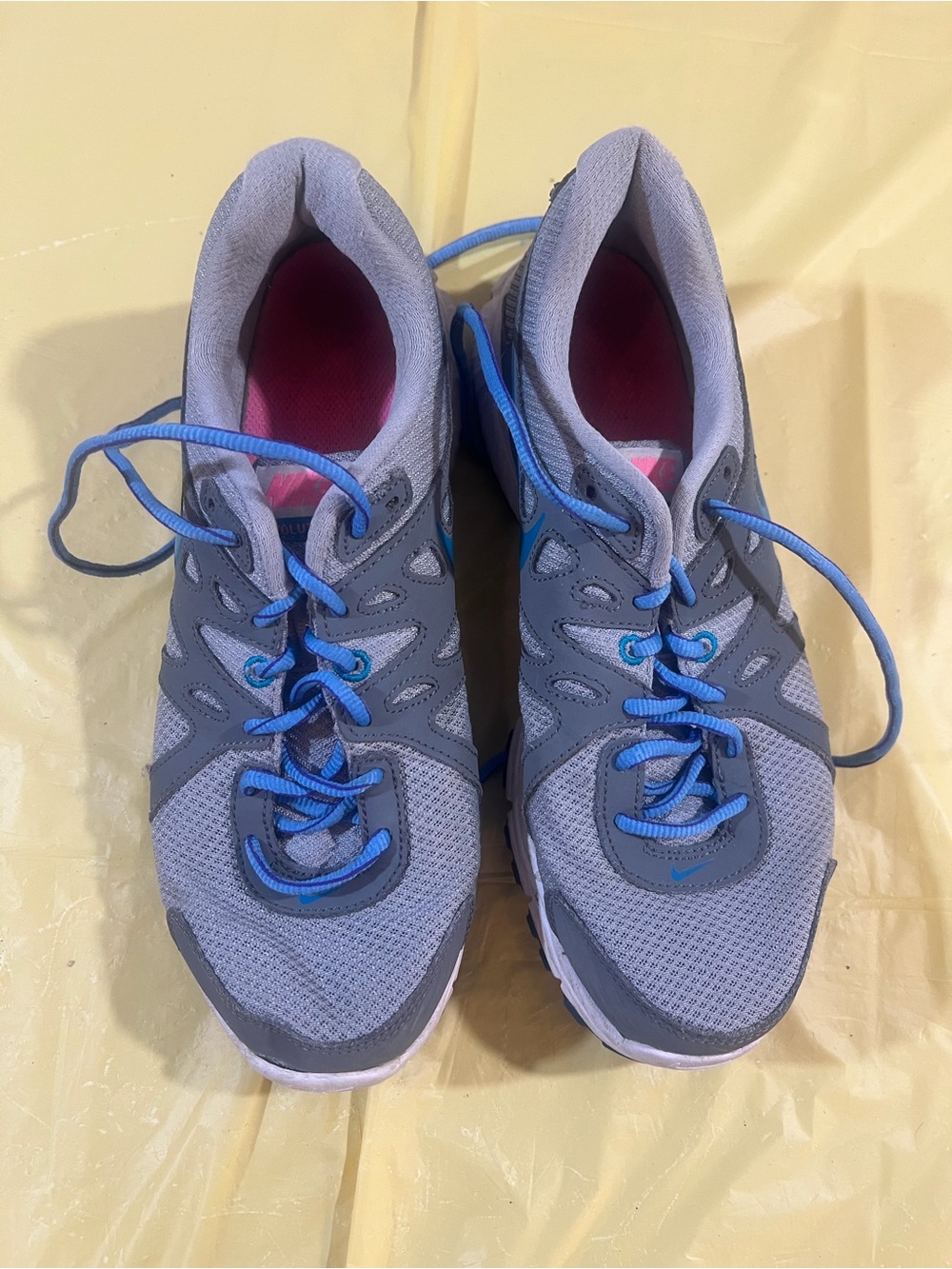 Nike Women's Gray Athletic Sneakers with Blue Laces and Pink Interior A2